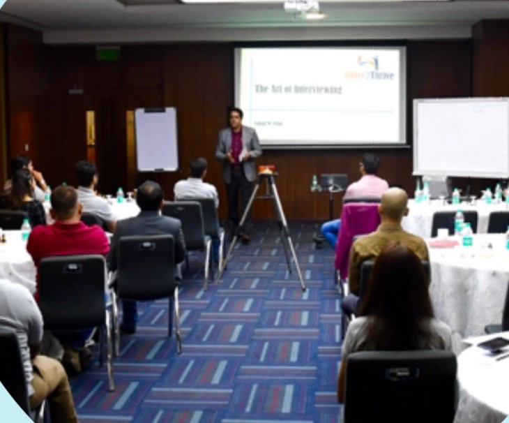 Faisal M. Paul delivering a coaching workshop